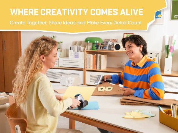 Two people using Fanttik C11 Ultra rechargeable electric cardboard cutter electric scissors to make cardboard craft art together