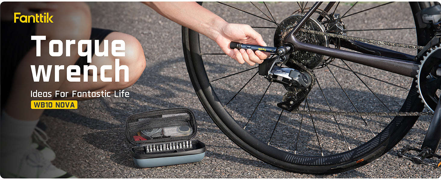 Person using a torque wrench on a bicycle with a tool case in the foreground, featuring Fanttik branding.