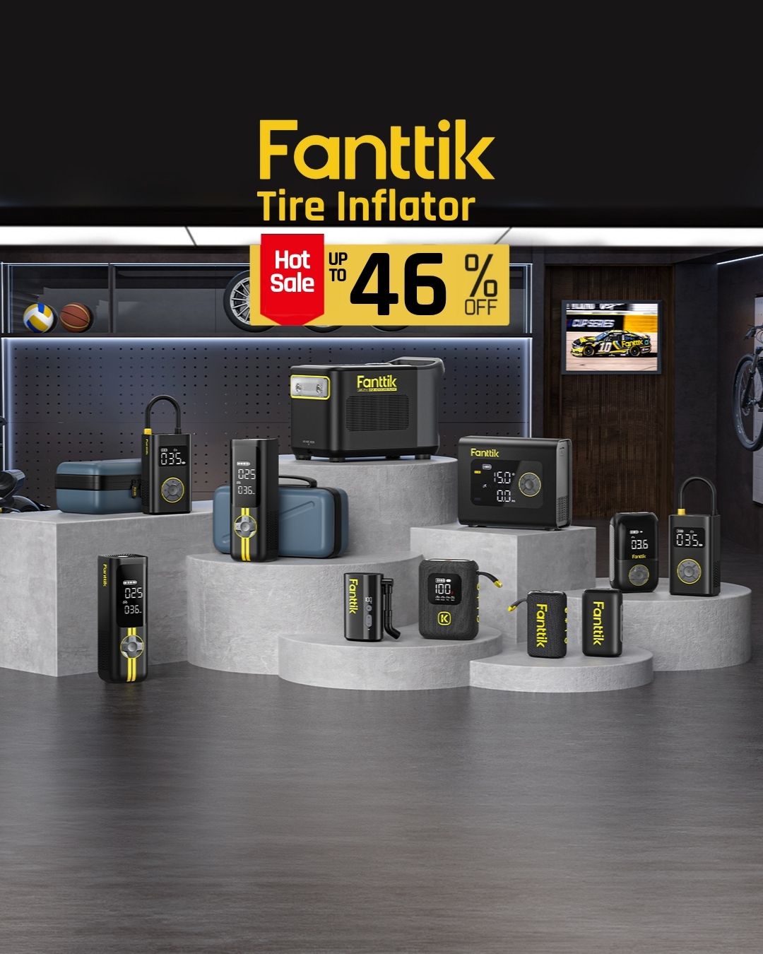 A promotional display for Fanttik Tire Inflator products in a showroom-like setting. Multiple black and gray tire inflation devices with yellow accents are arranged on gray pedestals, with a large Fanttik logo and a red 'Hot Sale up to 46% off' banner above.