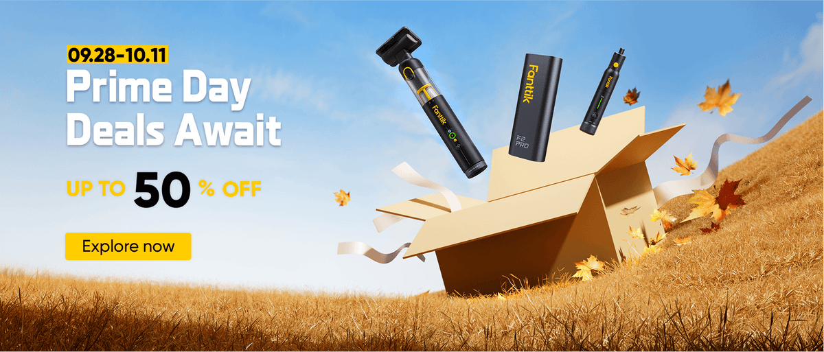 Promotional banner for Prime Day deals featuring three black and yellow Trekking Paks portable power banks emerging from an open cardboard box on a grassy hill under a blue sky with falling autumn leaves. Text on the left reads '09.