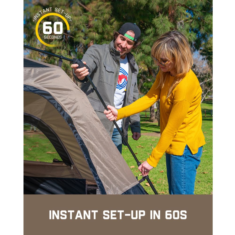 Two people setting up FanttikOutdoor Zeta C4 Pro 4 Person Camping Tent in a park, demonstrating instant set-up in 60 seconds.
