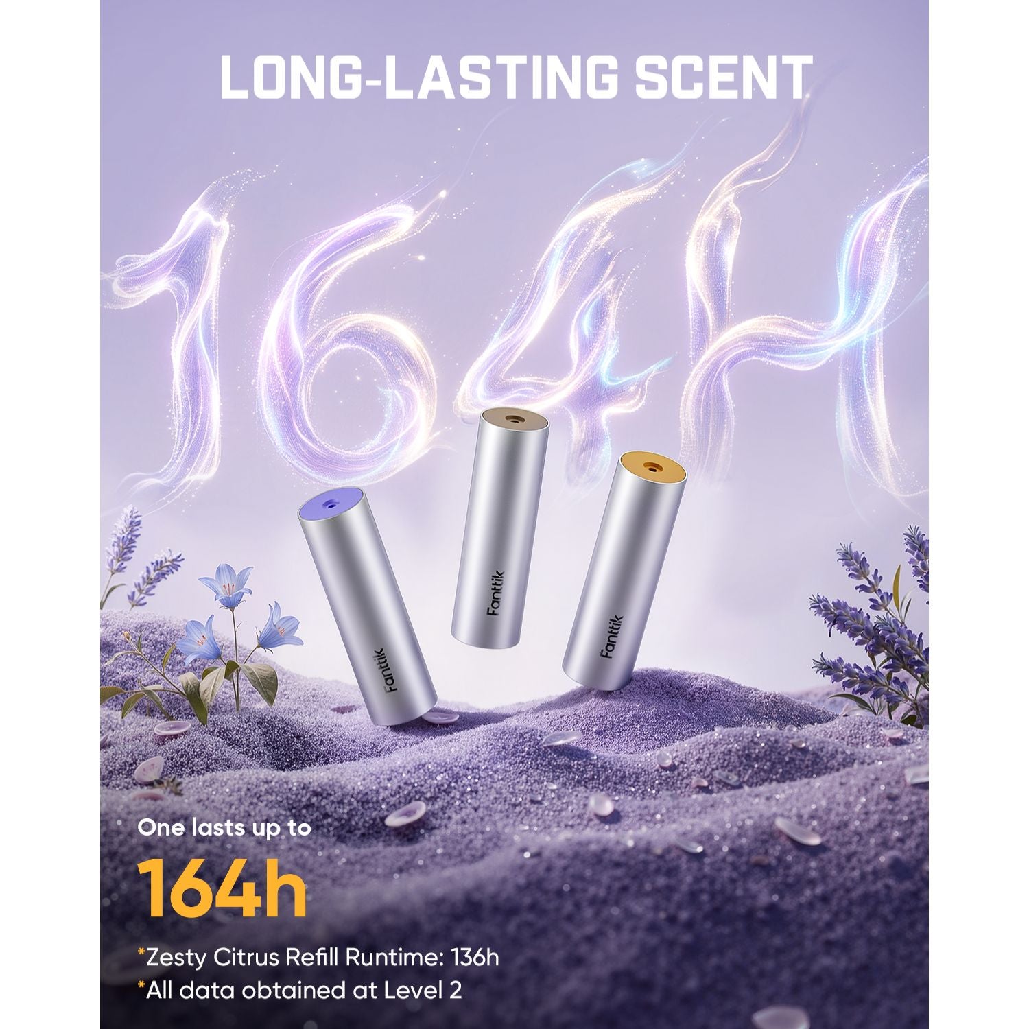 Three cylindrical Zesty Citrus refillable battery pods standing upright on lavender-scented sand with flowers, under a purple sky with glowing '164h' text and the headline 'LONG-LASTING SCENT'.