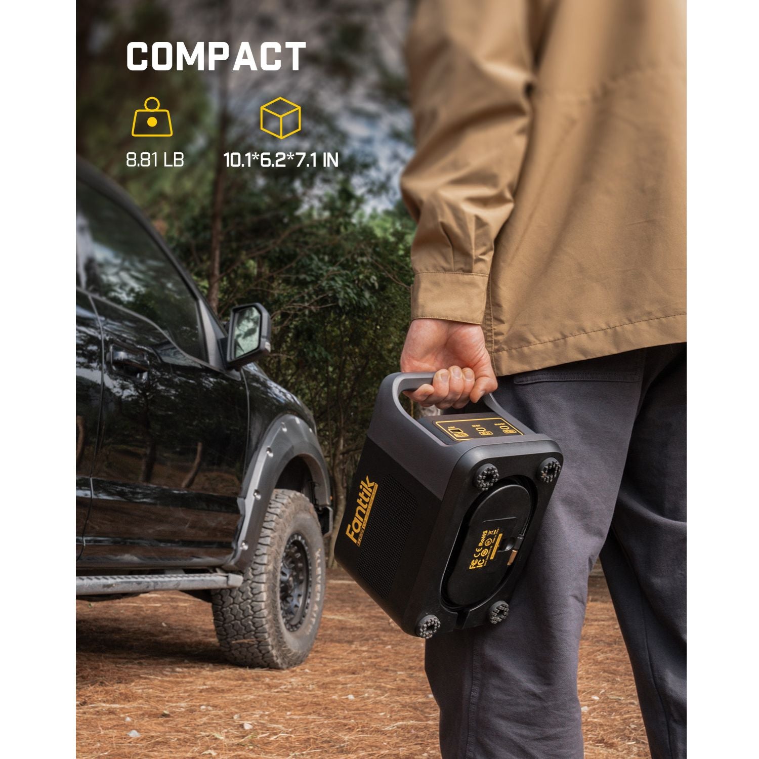 Person holding compact Fanttik X9 Ultra™ Tire Inflator near black SUV in outdoor setting, highlighting dimensions and weight.