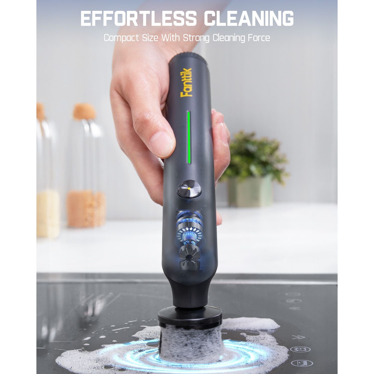 Fanttik G9 Nano electric scrubber cleaning stovetop. Features 'Effortless Cleaning' text.
