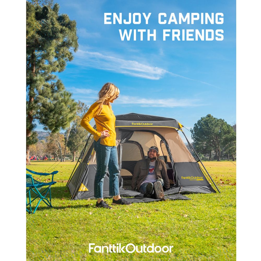 Two people camping in a green field with a FanttikOutdoor tent, enjoying nature. The text reads 'ENJOY CAMPING WITH FRIENDS'.