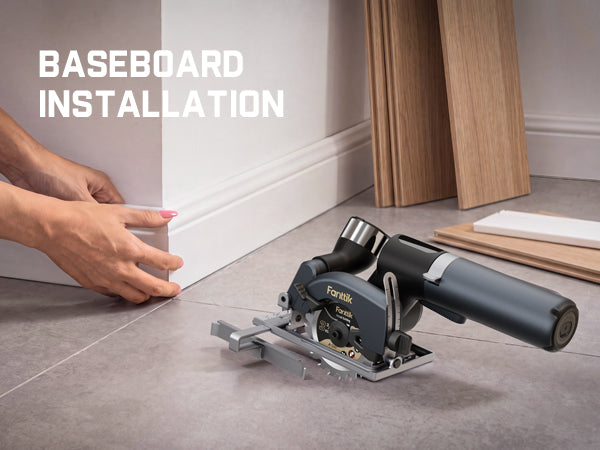 A Fanttik O11 Pro 3-3/8 Inch Cordless Circular Saw baseboard attachment shown on a gray tile floor next to a person's hands installing a white baseboard, with the text 'BASEBOARD INSTALLATION' on the upper left.