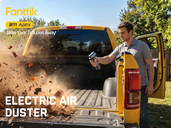 Man using an electric air duster on a truck bed with 'Fanttik' branding.
