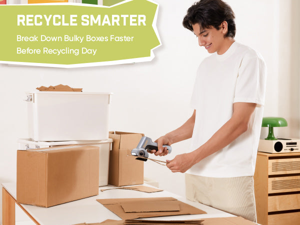Man using Fanttik C11 Ultra Electric Cardboard Cutter electric scissors breaking down cardboard boxes for recycling