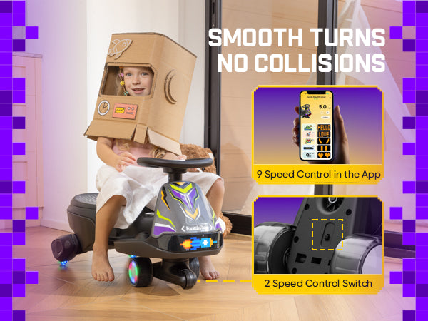 A child wearing a cardboard space helmet sits on a toy ride-on car in a brightly lit indoor room. The ride-on is dark gray with purple and yellow graphic accents and LED lights.
