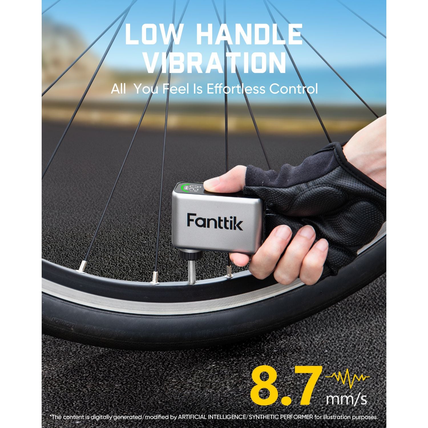 A hand wearing a black fingerless glove holds a silver and black Fanttik vibration sensor against a bicycle wheel on an asphalt road, with promotional text reading 'LOW HANDLE VIBRATION' and '8.7 mm/s'.